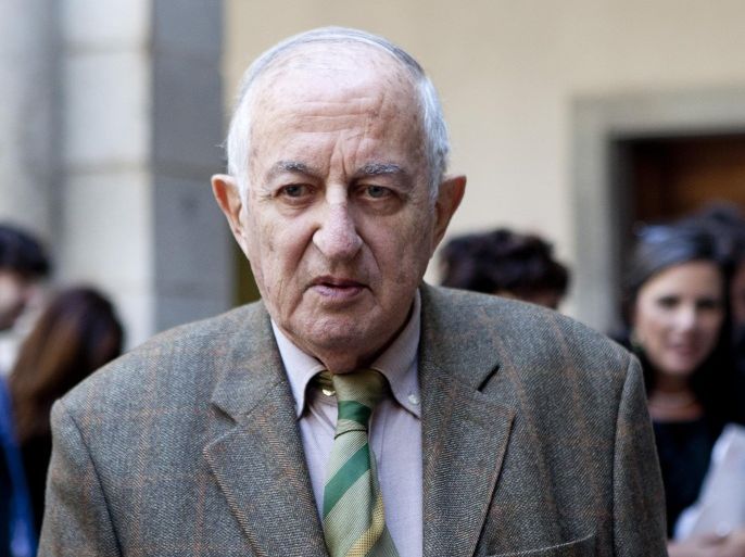 Spanish author Juan Goytisolo arrives at the Cervantes Prize award ceremony, at the University of Alcala de Henares, Spain, Thursday, April 23, 2015. Goytisolo, 83, considered one of Spain’s most important writers since the 1936-1939 Spanish Civil War is to be presented with the Cervantes prize, the Spanish-speaking world's top literary honor. (AP Photo/Abraham Caro Marin)