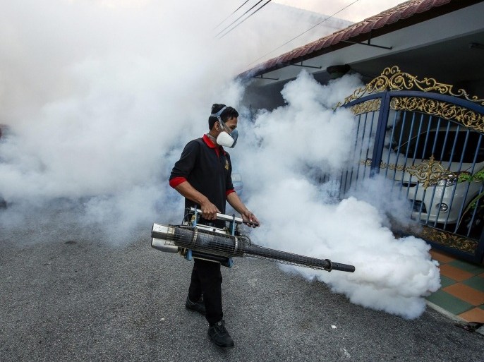 A Malaysian Health Department staff member uses a nebulizer to spray insecticide in order to control the mosquito poulation, in Kuala Lumpur, Malaysia, 22 January 2014. The Malaysian Health Ministry declared dengue an epidemic on July 2014 and it remains as a major killer in the country, report said.