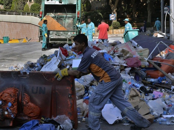 Workers clear the area of clashes between Lebanese activists and riot police 23 August in front of the Lebanese Government Palace, downtown Beirut, Lebanon, 24 August 2015. According to local reports Lebanese citizens gathered to protest the Governments ongoing inability to find a solution to the country's continuing garbage crisis, which has left streets overflowing with garbage, due in large part to graft associated with the awarding of contracts to private companies linked to the Government to operate collections. However, Prime Minister Tammam Salam, has threatened to resign as a result of the 'You Stink' protests, which on their second day 23 August as thousands took to the streets, turned violent.