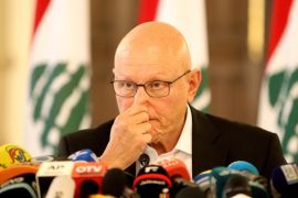 Lebanese Prime Minister Tammam Salam pleads for calm during a press conference on August 23, 2015 in Beirut as protestors demand the Lebanese government resign over its failure to remove uncollected rubbish from the streets. Demonstrators clashed with police in Beirut for a second day, leaving dozens injured. Anger about rubbish overflowing in the streets since Lebanon's largest landfill was closed on July 19th boiled over on August 22nd when thousands rallied outside the prime minister's office in central Beirut. AFP PHOTO /str
