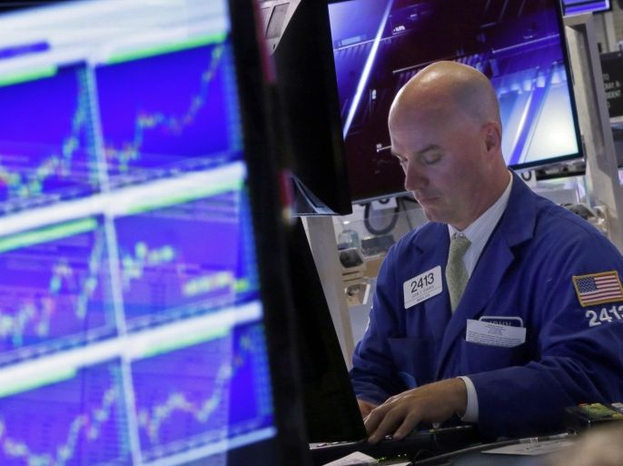 Specialist John O'Hara works at his post on the floor of the New York Stock Exchange, Wednesday, Aug. 26, 2015. U.S. stocks closed sharply higher, giving the stock market its best day in close to four years. The Dow Jones industrial average climbed 619 points, or 4 percent on Wednesday. (AP Photo/Richard Drew)