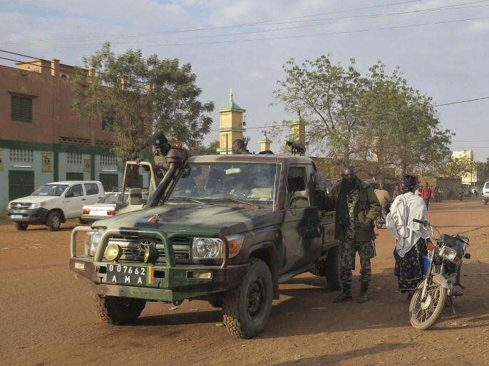 (FILE) A file picture dated 25 January 2013 shows Malian forces patrolling through the northern town of Sevare, Mali. Unknown rebels launched an attack on a key trading hub in northern Mali, laying siege to at least three hotels frequented by foreigners, army sources said 07 August 2015. Armed with machine guns, the suspected Islamist militants arrived on motorbikes and attacked at least three hotels in the town of Sevare, an army source told German news agency dpa on condition of anonymity. EPA/STR *** Local Caption *** 50682072