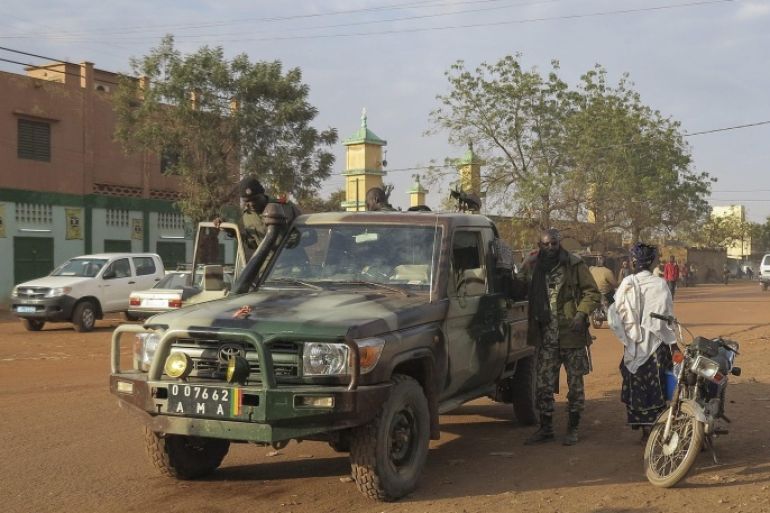 (FILE) A file picture dated 25 January 2013 shows Malian forces patrolling through the northern town of Sevare, Mali. Unknown rebels launched an attack on a key trading hub in northern Mali, laying siege to at least three hotels frequented by foreigners, army sources said 07 August 2015. Armed with machine guns, the suspected Islamist militants arrived on motorbikes and attacked at least three hotels in the town of Sevare, an army source told German news agency dpa on condition of anonymity. EPA/STR *** Local Caption *** 50682072