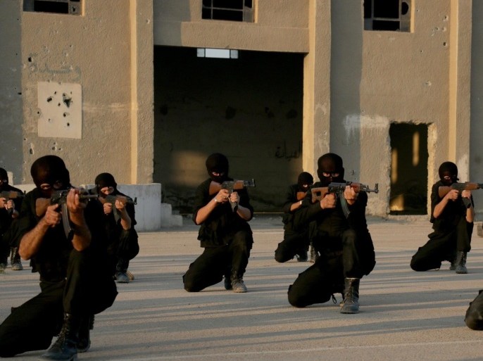 DAMASCUS, SYRIA - JULY 12: Syrian opponents from Ar-Rahman Brigades undergo one month military training, on July 12, 2015 in the eastern Gouta region of Damascus, Syria. 150 Syrian opponents master in close defense techniques, physical training, use of weapons and raid to terrorist units within this military training.