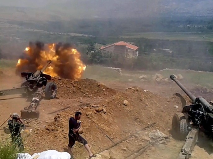 A handout picture made available by Syrian Arab news agency SANA shows Syrian army soldiers during a artillery operations in al-Zabadani area in western rural Damascus, Syria, 09 July 2015. According to SANA Syrian Units of the army and the armed forces continued to launch wide-scale military operations against the Takfiri terrorist organizations across the country, killing scores of their members and destroying their arms and vehicles. EPA/SANA HANDOUT