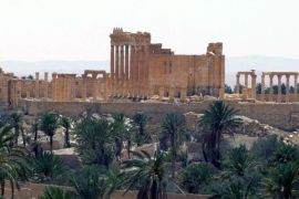 FILE - This file photo released on Sunday, May 17, 2015, by the Syrian official news agency SANA, shows the general view of the ancient Roman city of Palmyra, northeast of Damascus, Syria. The rampage by IS, targeting priceless cultural artifacts often spanning thousands of years, has sparked global outrage and accusations of war crimes. The militants are also believed to be selling ancient artifacts on the black market in order to finance their bloody campaign across the region. (SANA via AP, File)