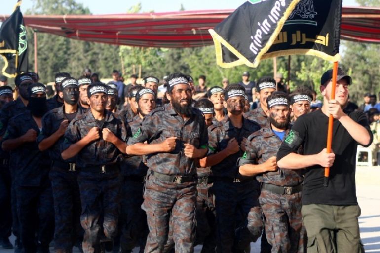 DAMASCUS, SYRIA - JUNE 16: Opposition militias are seen during a training session held by the anti-regimist Ahrar ash-Sham forces in East Ghouta Region of Damascus, Syria on June 16, 2015.