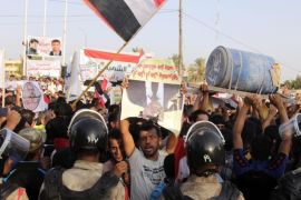 Iraqi protesters shout slogans during a demonstration against corruption in the Iraqi Government in front of the local government buildings in Basra, southern Iraq, 14 August 2015. Hundreds of Iraqis rallied in the capital Baghdad, and southern provinces, demanding implementation of wide reforms that Prime Minister Haider al-Abadi had pledged days earlier. The demonstrators gathered in central Baghdad's Tahrir Square amid tight security for fear of attacks by the Islamic State extremist militia.