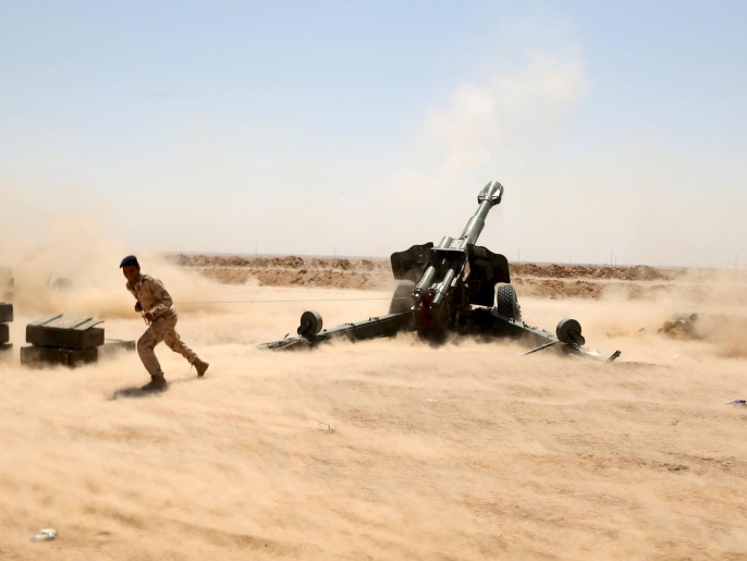 ‪القوات العراقية خلال معارك مع تنظيم الدولة بضواحي الأنبار‬  