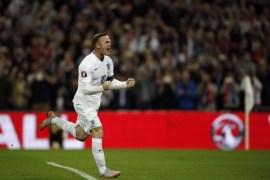 REB1055 - London, Greater London, UNITED KINGDOM : England's striker Wayne Rooney celebrates after scoring from the penalty spot to score his 50th goal for England, making him the country's all-time goal scorer, during the Euro 2016 qualifying group E football match between England and Switzerland at Wembley Stadium in west London on September 8, 2015. AFP PHOTO / ADRIAN DENNIS