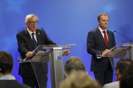 European Commission President Jean-Claude Juncker and EU council President Donald Tusk (R) give a press briefing at the end of an extraordinary EU Summit on the current migration and refugees crisis in Europe, in Brussels, Belgium, 24 September 2015. Tusk said that the European Union will set up special reception centers for migrants in frontline states by the end of November, and it vowed to increase aid for Lebanon, Jordan and Turkey, and other countries in the region where refugees from warn-torn countries have fled.