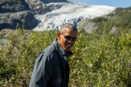 President Barack Obama speaks to members of the media while on a hike to the Exit Glacier in Seward, Alaska, Tuesday, Sept. 1, 2015, which according to National Park Service research, has retreated approximately 1.25 miles over the past 200 years. Obama is on a historic three-day trip to Alaska aimed at showing solidarity with a state often overlooked by Washington, while using its glorious but changing landscape as an urgent call to action on climate change. (AP Photo/Andrew Harnik)