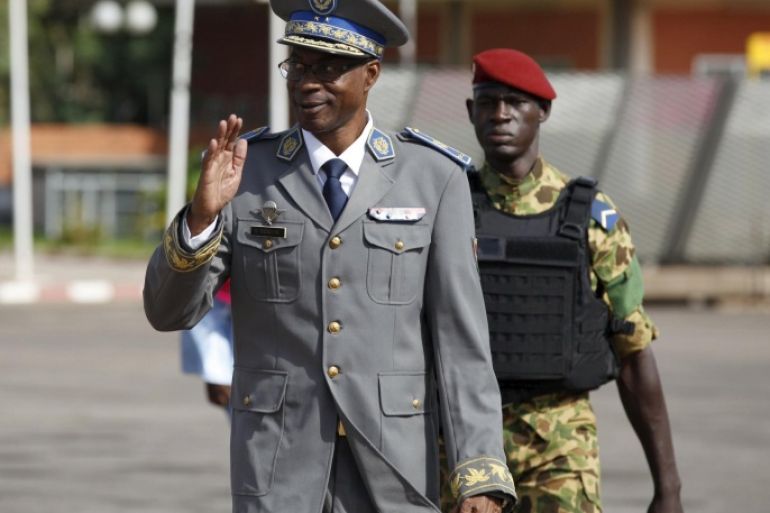 Burkina Faso's coup leader General Gilbert Diendere arrives at the airport to greet foreign heads of state in Ouagadougou, Burkina Faso, September 23, 2015. Following an emergency summit of the regional bloc ECOWAS in Nigeria on Tuesday, the presidents of Senegal, Togo, Benin, Ghana, Niger and Nigeria were to travel Burkina Faso on Wednesday to ensure that President Michel Kafando is reinstalled. REUTERS/Joe Penney