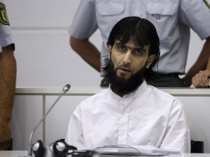Iraqi defendant Rafik Y. awaits his verdict in a court room in Stuttgart Stammheim in this July 15, 2008 file photo. German police said on September 17, 2015 that they had shot dead a man they described as a convicted member of a terrorist group after he attacked a policewoman in western Berlin with a knife. German media identified the man as Rafik Y. In 2008, three men, including one named Rafik Mohamad Yousef, were convicted in Germany of hatching a plot to kill Iraqi prime minister Ayad Allawi during a visit to Berlin in 2004. REUTERS/Alex Grimm/Files ATTENTION EDITORS - BY REQUEST FROM THE GERMAN COURTS, THE FACE OF THE SUSPECT MUST BE PIXELISED. TEMPLATE OUT