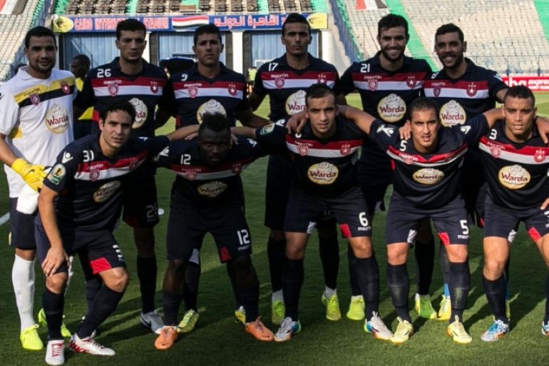 Tunisia's Etoile du Sahel's players pose before their CAF Confederation Cup group B football match against Egypt's al-Ahly at the Cairo International Stadium in the Egyptian capital on August 23, 2014. AFP PHOTO / MOHAMED EL-SHAHED