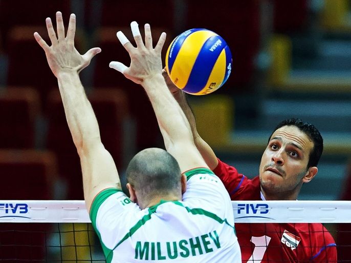 Danail Milushev (L) of Bulgaria in action against Saleh Youssef (R) of Egypt during the group C match between Bulgaria and Egypt of the FIVB Volleyball Men's World Championship 2014 at the Ergo Arena in Gdansk, Poland, 06 September 2014. EPA/ADAM WARZAWA POLAND OUT