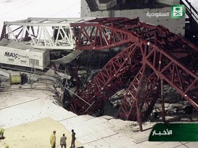 In this still image taken from video released by Saudi TV, a crane is seen collapsed over the Grand Mosque in Mecca, killing dozens, Friday, Sept. 11, 2015. The accident happened as pilgrims from around the world converged on the city, Islam's holiest site, for the annual Hajj pilgrimage, which takes place this month. (Saudi TV via AP)