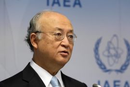 FILE - In this June 8, 2015 file photo, Director General of the International Atomic Energy Agency, IAEA, Yukiya Amano of Japan addresses the media during a news conference after a meeting of the IAEA board of governors at the International Center in Vienna, Austria. Iran said a Sunday, Sept. 20, 2015 visit by the U.N. nuclear chief to Tehran is aimed at implementing an agreement between Tehran and the UN nuclear watchdog according to the official IRNA news agency on Saturday. (AP Photo/Ronald Zak, File)