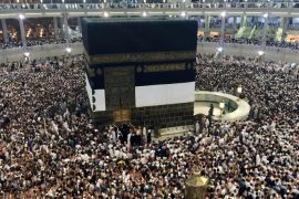Muslim pilgrims moving around the Kaaba, the black cube at center, inside the Grand Mosque, a day before Muslim's annual pilgrimage, known as the Hajj, in the Muslim holy city of Mecca, Saudi Arabia, Wednesday, Oct. 1, 2014. (AP Photo/Khalid Mohammed)