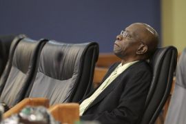 Former FIFA vice-president Jack Warner, who is a parliamentary representative for Chaguanas West, sits in parliament in Port-of-Spain, June 5, 2015. Warner, a central figure in world soccer's deepening scandal, on Wednesday vowed to tell investigators all he knows about corruption within the sport's governing body. REUTERS/Andrea de Silva