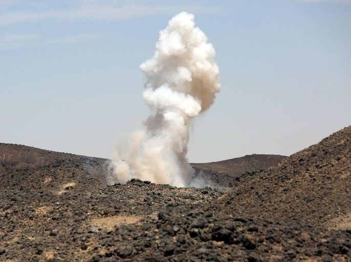 Smoke billows from a position of fighters loyal to Yemen's government after Houthi militants fired a shell in the frontline province of Marib September 24, 2015. REUTERS/Stringer