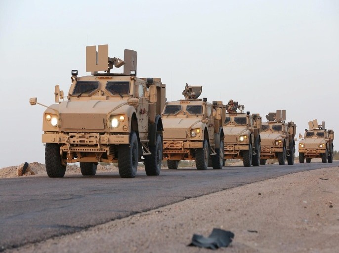 Military armoured vehicles carrying soldiers loyal to Yemen's exiled government are seen on a road in the northern province of Marib, September 9, 2015. As many as 800 Egyptian soldiers arrived in Yemen late on Tuesday, Egyptian security sources said, swelling the ranks of a Gulf Arab military contingent which aims to rout the Iran-allied Houthi group after a five-month civil war. REUTERS/Stringer