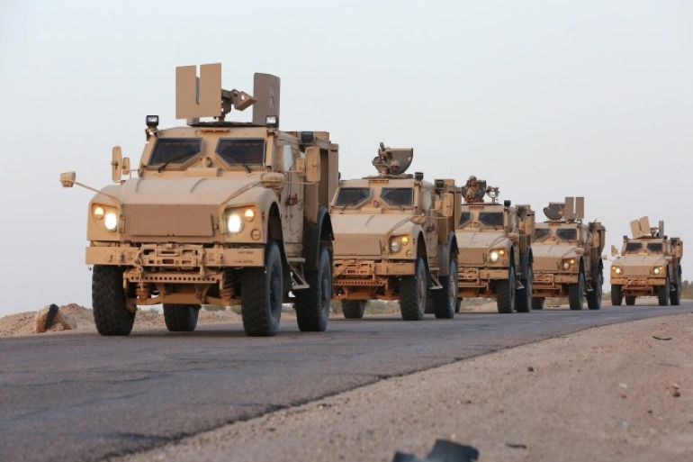 Military armoured vehicles carrying soldiers loyal to Yemen's exiled government are seen on a road in the northern province of Marib, September 9, 2015. As many as 800 Egyptian soldiers arrived in Yemen late on Tuesday, Egyptian security sources said, swelling the ranks of a Gulf Arab military contingent which aims to rout the Iran-allied Houthi group after a five-month civil war. REUTERS/Stringer
