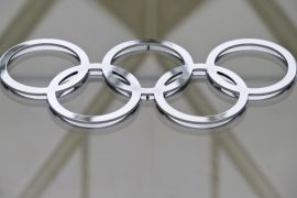 The Olympic logo is pictured in the building of the IOC (International Olympic Committee) headquarters in Lausanne on May 8, 2012.