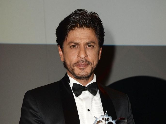 LONDON, ENGLAND - APRIL 17: SUN NEWSPAPER OUT. MANDATORY CREDIT PHOTO BY DAVE J. HOGAN GETTY IMAGES REQUIRED Shah Rukh Khan accepts the award for Outstanding Achievement in Cinema during The Asian Awards 2015 at The Grosvenor House Hotel on April 17, 2015 in London, England.