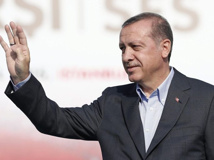 Turkish President Recep Tayyip Erdogan cheers his fans during a rally against what they claim is 'PKK terror' in Istanbul, Turkey, 20 September 2015. Violence has escalated between the banned Kurdish Workers Party PKK and Turkey since a ceasefire broke down in July 2015. The Turkish Air Force has also attacked PKK targets within its borders.