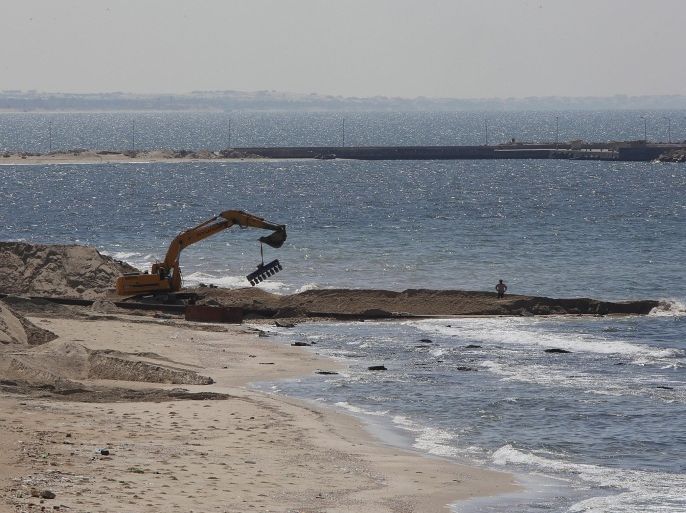 A view of works being done on the Egyptian coastline of the Mediterranean Sea, seen from the Gaza side of the border between Egypt and Gaza, in Rafah, southern Gaza Strip, 19 September 2015. The Egyptian army has begun to pump water from the Mediterranean Sea into underground smuggling tunnels connecting Sinai with the Gaza Strip, security officials and eye witnesses reported on 18 September 2015. Gaza, administered by the Islamic Hamas movement, remains under a tight blockade imposed by Israel and Egypt.