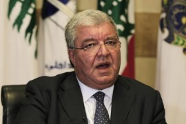 Lebanese Interior Minister Nohad Machnouk, speaks during an interview with the Associated Press at his office, in the interior ministry, in Beirut, Lebanon, Friday, Aug. 28, 2015. Machnouk said Security forces have orders to show restraint at a planned mass protest against Lebanon's government this weekend, but will not tolerate attempts by "thugs" to make trouble. Two rallies in the capital of Beirut last weekend drew 20,000 people, and dozens were hurt in clashes between protesters and security forces at the time. (AP Photo/Bilal Hussein)