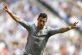 Real Madrid's Portuguese player Cristiano Ronaldo celebrates his first goal during the Primera Division match against Espanyol held at the Power 8 Stadium in Cornella, Barcelona, Spain, 12 September 2015.