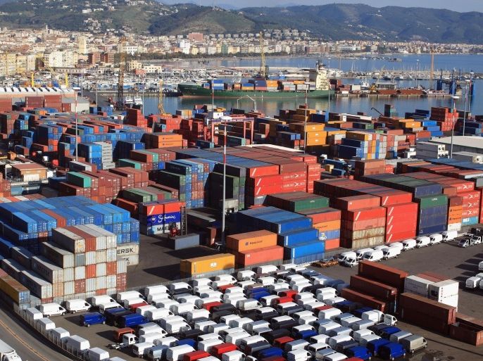 SALERNO, ITALY - NOVEMBER 15: Containers and vehicles ready for export wait on the quayside to be loaded on to ships at the busy Italian Port of Salerno on November 15, 2011 in Salerno, Italy. Recently appointed Prime Minister Mario Monti is consulting with Italy's main political parties to form a new government and relieve the country of it's massive dept which is crippling the eurozone.