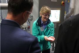 Jane Ritchie explains the carbon capture system at the opening of a Canadian Carbon Engineering pilot plant in Squamish, British Columbia on October 9, 2015