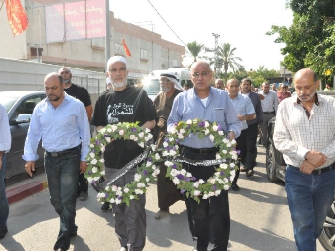 وفد لجنة الحريات يزور ضريح الشهيد رامي غرة بانطلاق مسيرة الوفاء للشهداء