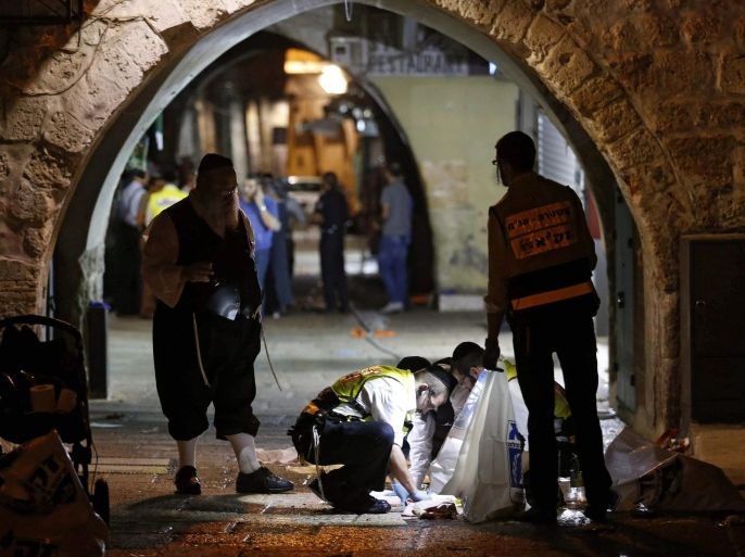 A ZAKA team at the scene where two Israelis were killed and two others were seriously injured by a Palestinian attacker in the alleys of the Old City of Jerusalem, Israel, 03 October 2015. A Palestinian man attacked an Israeli family in Jerusalem killing the father and another man before being shot dead by security forces. Two other members of the family were injured, including a toddler, Israeli police said. The attacker stabbed the Jewish family with a knife and then took a gun he obtained from one of the wounded and began firing at the responding officers, who fatally shot him.
