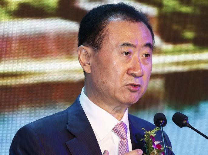 China's Dalian Wanda Group Chairman Wang Jianlin delivers a statement during a a signing ceremony with World Triathlon Group (WTC) at a hotel in Beijing, China, 27 August 2015. According to a statement from Wanda Group, it has reached an agreement to acquire WTC for 650-million US dollar (573-million euro) plus debt. The WTC, under Providence Equity Partners, licenses the Ironman brand.