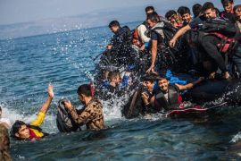 Migrants make it to land on a rubber dinghy on the coast near Skala Sikaminias, Lesbos island, Greece, 04 October 2015. An estimated 100,000 refugees and migrants arrived on Greek islands during August, according to the Hellenic Coast Guard.