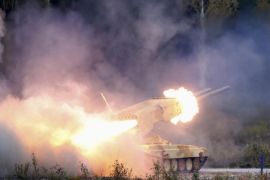 A Russian "TOS-1 Buratino" multiple rocket launcher fires during the "Russia Arms Expo 2013" 9th international exhibition of arms, military equipment and ammunition, in the Urals city of Nizhny Tagil, September 25, 2013. REUTERS/Sergei Karpukhin (RUSSIA - Tags: MILITARY)