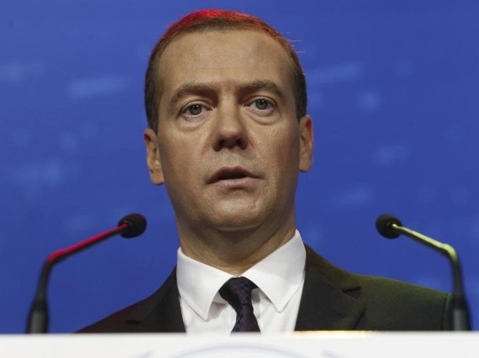 Russia's Prime Minister Dmitry Medvedev delivers a speech during a session of the International Investment Forum Sochi-2015 in Sochi, Russia, October 2, 2015. Oil prices are likely to remain at their current low level for "quite long," Russian Prime Minister Dmitry Medvedev said in a speech on Friday. REUTERS/Dmitry Astakhov/RIA Novosti/Pool ATTENTION EDITORS - THIS IMAGE HAS BEEN SUPPLIED BY A THIRD PARTY. IT IS DISTRIBUTED, EXACTLY AS RECEIVED BY REUTERS, AS A SERVICE TO CLIENTS.