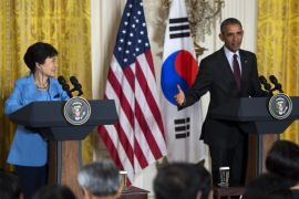 US President Barack Obama, with South Korean President Park Geun-hye, responds to a question from the news media during a joint press conference in the East Room of the White House in Washington, DC, USA, 16 October 2015.