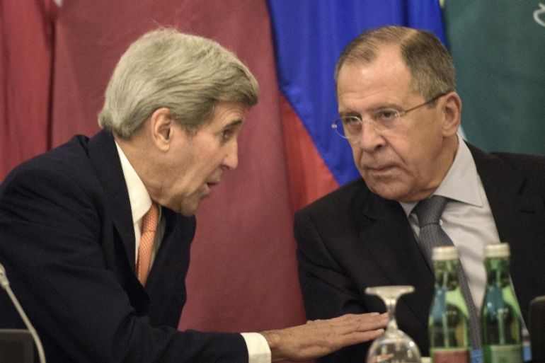 US Secretary of State John Kerry, left, and Russian Foreign Minister Sergey Lavrov share a word prior to the start of the Syria talks at a hotel in Vienna, Austria, Friday, Oct. 30, 2015. Kerry is acknowledging that progress will be difficult as he launches a marathon day of talks aimed at ending the Syrian War but is expressing some hope of headway. With 19 foreign ministers and other senior dignitaries attending, participants say the fact that the talks are happening despite deep divisions among key players are in themselves a sign of success. (Brendan Smialowski/Pool Photo via AP)