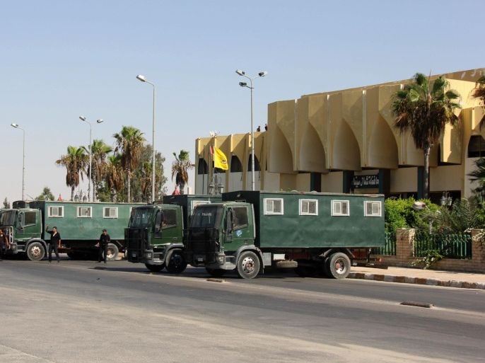 Egyptian security forces deployed in front of the North Sinai governorate building amid unrest events, North Sinai town of Arish, Egypt, 18 August 2013. Egyptian army chief Abdel-Fattah al-Sissi, on 18 August, warned supporters of the toppled Islamist president Mohamed Morsi against further violence after days of deadly unrest. "He who thinks that violence will bring the state and Egyptians to their knees has to think again," al-Sissi said at a meeting of army and police commanders, according to the state-run newspaper al-Ahram.
