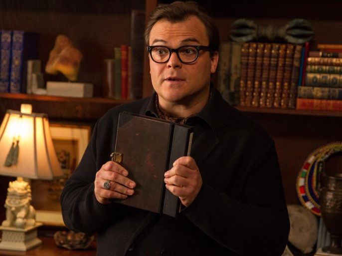 In this photo provided by Columbia Pictures, Jack Black who stars as R.L. Stine, Slappy, and Invisible Boy, appears in a scene in Columbia Pictures' "Goosebumps." (Hopper Stone, SMPSP/Columbia Pictures via AP)