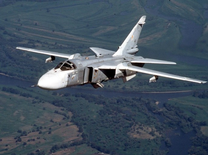 FILE In this file photo taken in this 2002 shows a Russian Su-24 medium-range bomber, known by NATO as "Fencer," flies somewhere at undisclosed location in Russia. A senior Russian government official said Friday March 27, 2015 that Moscow hasn’t held negotiations on leasing a dozen of supersonic bombers to Argentina, but would be willing to consider it.(AP Photo/File)