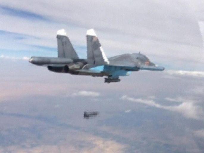 A frame grab taken from footage released by Russia's Defence Ministry October 9, 2015, shows a Russian Su-34 fighter-bomber dropping a bomb in the air over Syria. Russia's air force hit 60 Islamic State targets in Syria over the past 24 hours and killed around 300 militants, the Defence Ministry said on Friday, in Moscow's most intense raids yet since it first launched strikes on Syria 10 days ago. REUTERS/Ministry of Defence of the Russian Federation/Handout via Reuters ATTENTION EDITORS - FOR EDITORIAL USE ONLY. NOT FOR SALE FOR MARKETING OR ADVERTISING CAMPAIGNS. THIS IMAGE HAS BEEN SUPPLIED BY A THIRD PARTY. IT IS DISTRIBUTED, EXACTLY AS RECEIVED BY REUTERS, AS A SERVICE TO CLIENTS. REUTERS IS UNABLE TO INDEPENDENTLY VERIFY THE AUTHENTICITY, CONTENT, LOCATION OR DATE OF THIS IMAGE. FOR EDITORIAL USE ONLY. NO SALES.