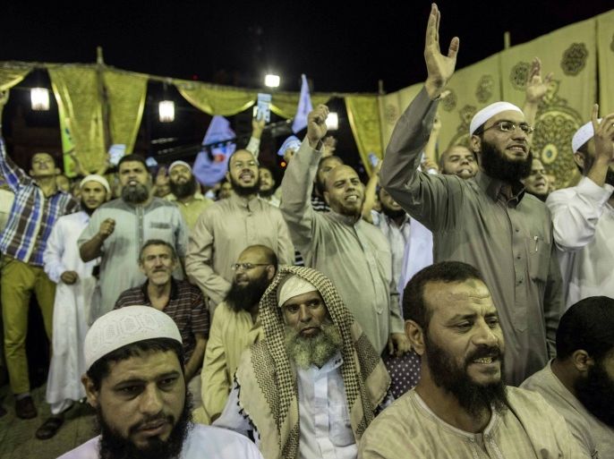 In this Tuesday, Oct. 6, 2015 photo, Salafists attend a campaign rally of the Al-Nour party in Alexandria, Egypt, ahead of Egyptian parliamentary elections that start later this month. The Salafist al-Nour party, a group who adhere to an ultraconservative sect of Islam, came in second only to the now-banned Muslim Brotherhood party in the previous parliamentary election. Al-Nour backed the military led ouster of Muslim brotherhood president Muhammed Morsi in 2013. (AP Photo/Eman Helal)