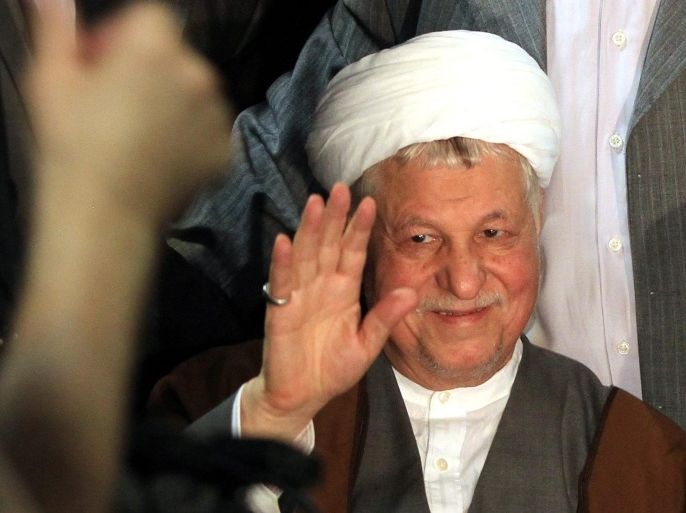 Former Iranian President Akbar Hashemi Rafsanjani waves as he registers his candidacy during the registration for Iran's upcoming presidential election on 14 June, in Tehran, Iran, 11 May 2013. Rafsanjani registered at the last moment on 11 May as a candidate.