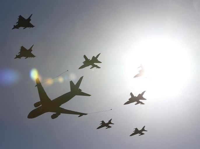 Military planes fly in formation during a NATO military exercise at the Birgi NATO Airbase in Trapani, Italy October 19, 2015. NATO and its allies opened their largest military exercise in more than a decade on Monday, choosing the central Mediterranean to showcase strengths that face threats from Russia's growing military presence from the Baltics to Syria. REUTERS/Tony Gentile